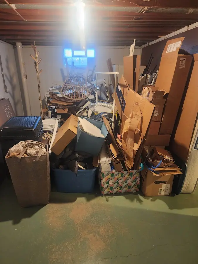 Roll-off dumpster container at job site for Yard Waste Dumpster Rental in Eden Isle